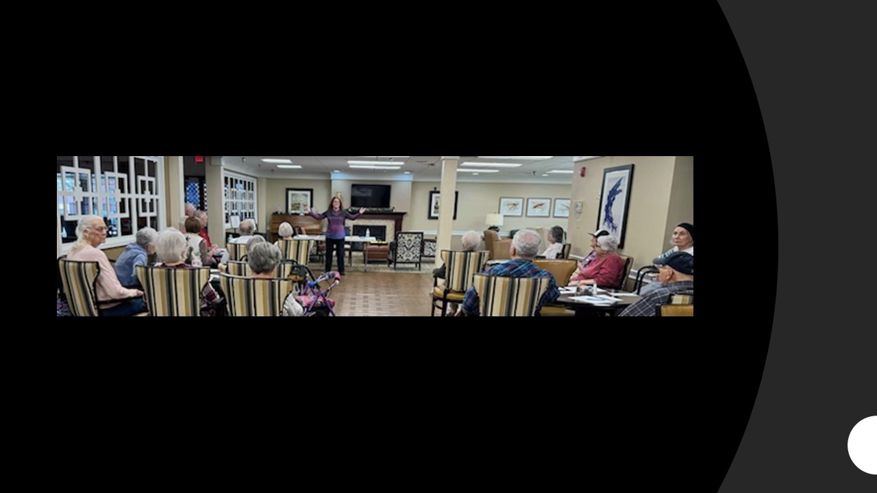 Debbie DeMoss Compton speaking to a group